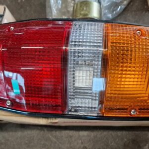 MB527097 Neue Rückleuchte links Mitsubishi L200 K1 1986-2001