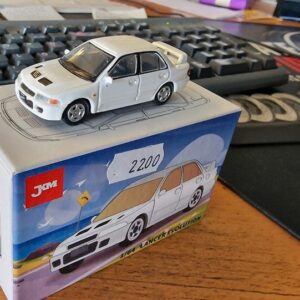 Modellauto Mitsubishi Evo 1 in 1/64 JKM in weiß